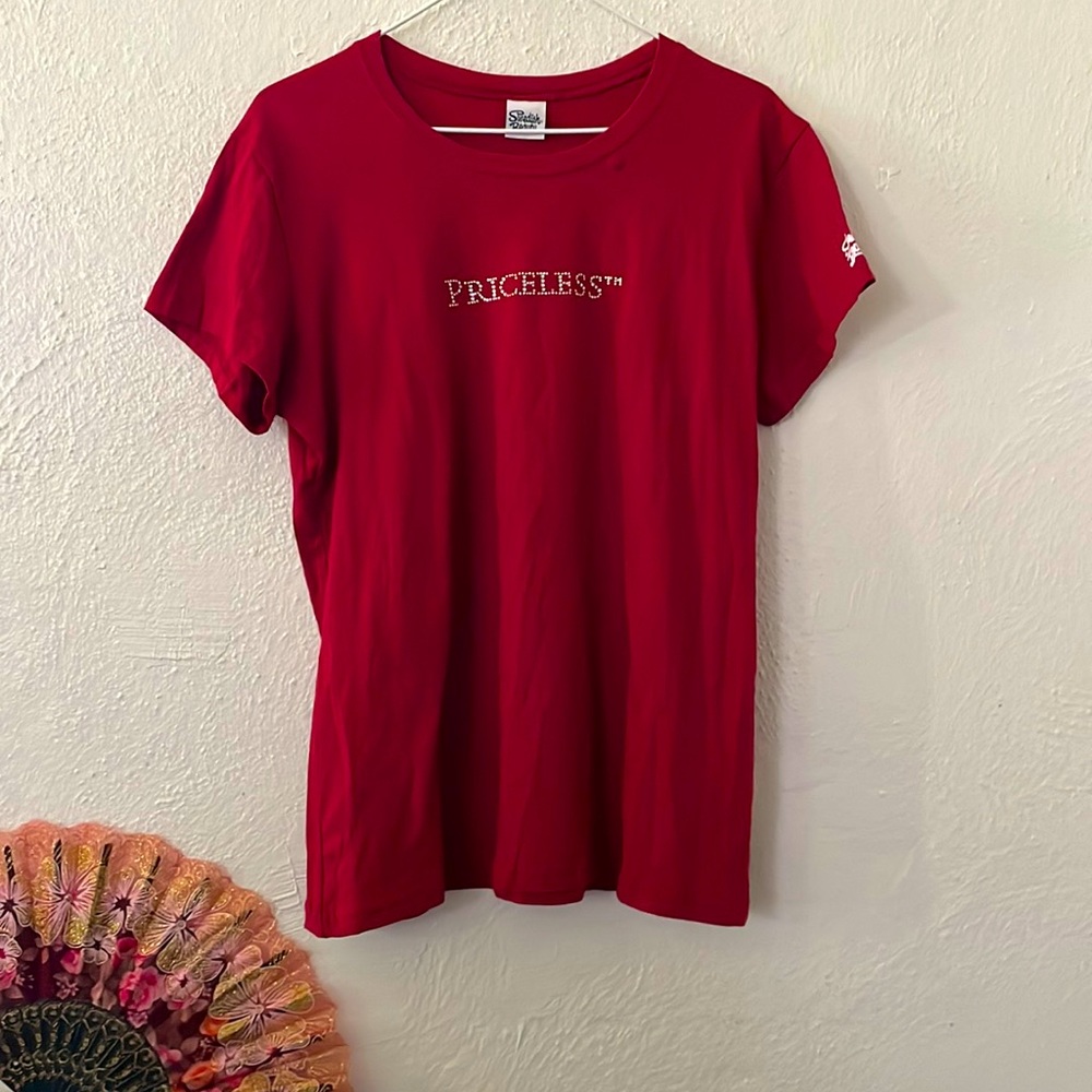 Swedish Beauty Short Sleeve Shirt. Rhinestone words “Priceless” on front. Size M